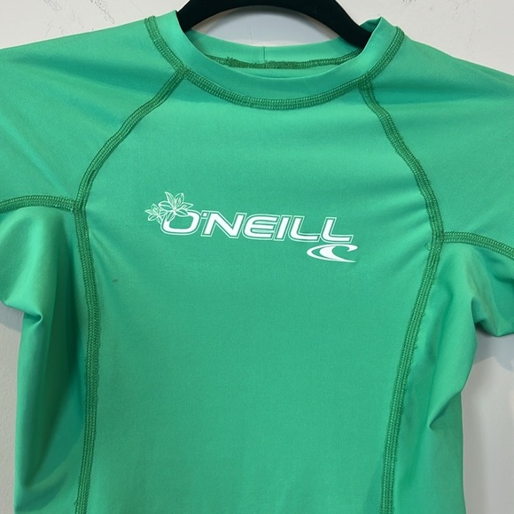 O'Neill Women's Size XS Short Sleeve Rashguard Green White UPF 50 - Picture 3 of 7